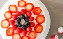 fresh fruit cake with whipped cream