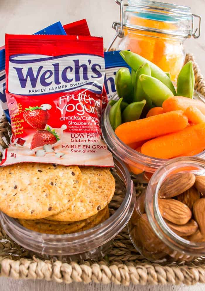 Back to School Snack Station with Welchs Fruit n Yogurt Bites carrots, snap peas, crackers, nuts, oranges and apples