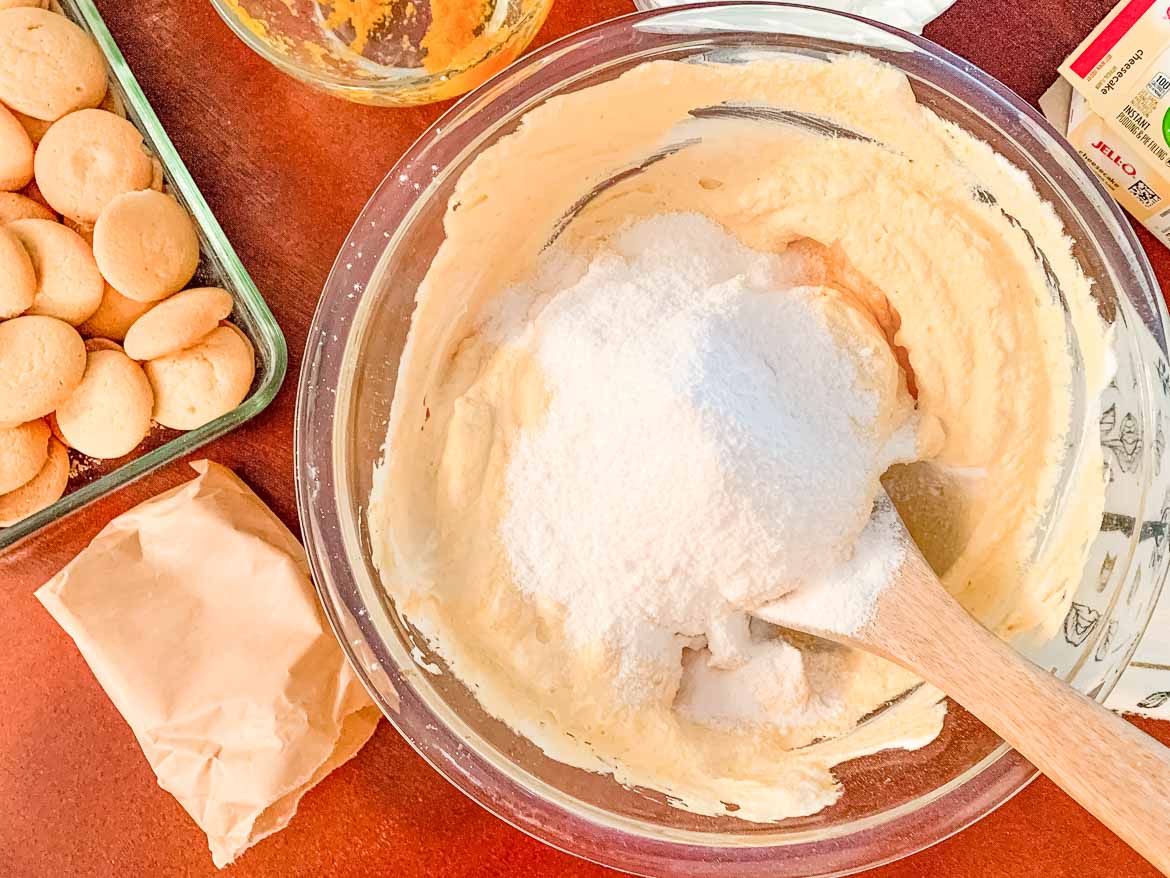 Adding cheesecake pudding mix to easy pumpkin dip with cool whip 