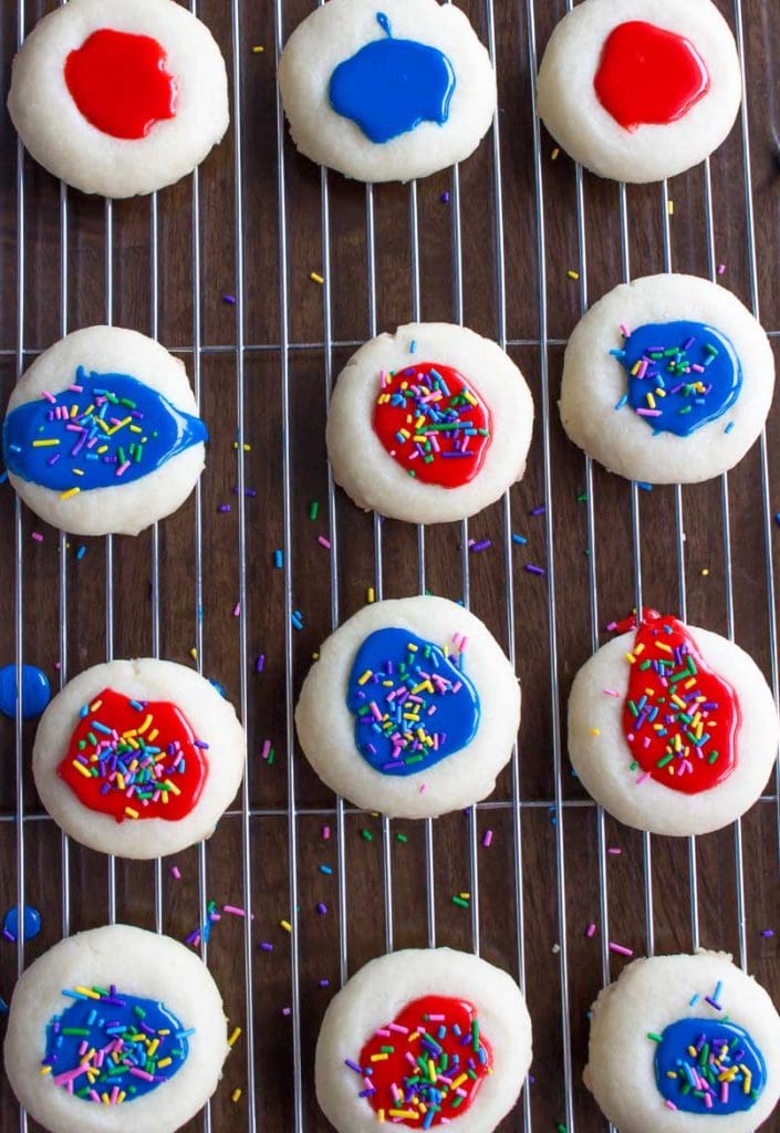 thumbprint cookies with icing and sprinkles