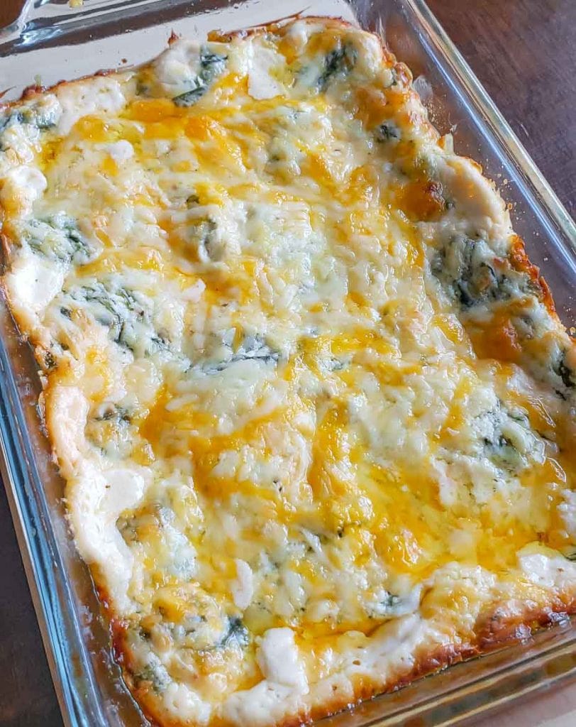 hot Asiago artichoke dip with spinach fresh out of the oven 