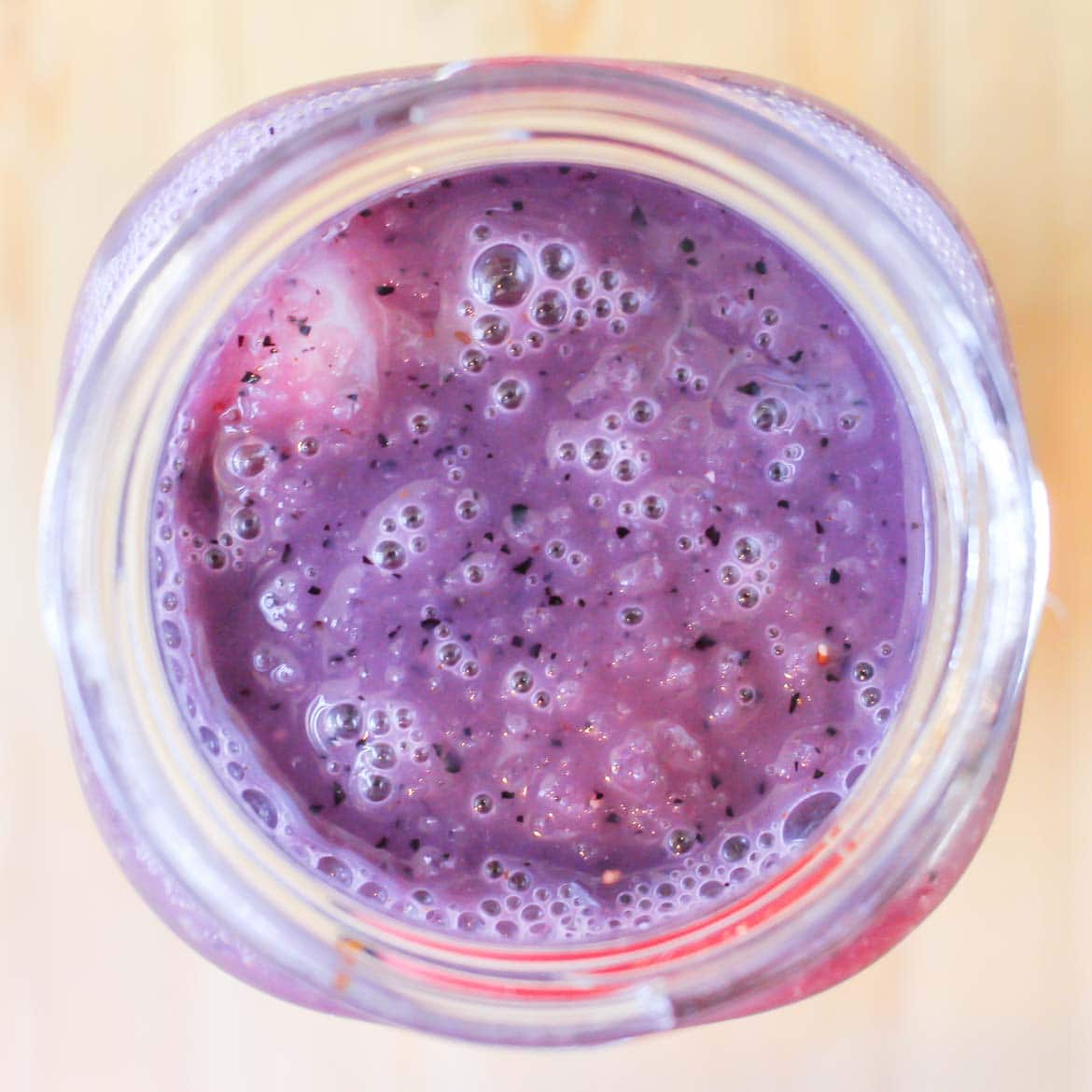 Almond milk berry smoothie with strawberries, blueberries and bananas