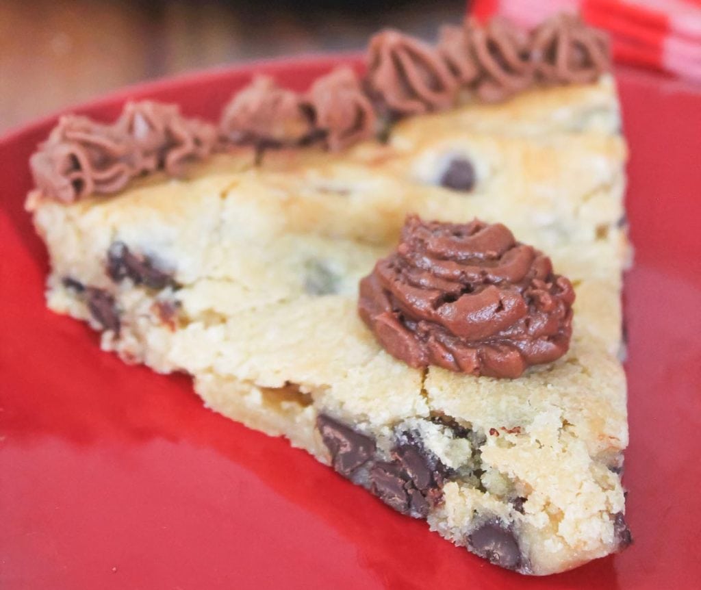 slice of giant chocolate chip cookie cake from 12 inch cookie