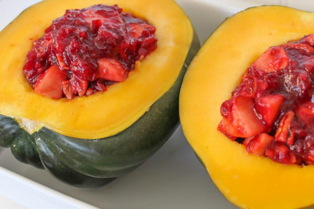 Pan Roasted Acorn Squash Stuffed with Apples Cranberries and Pecans