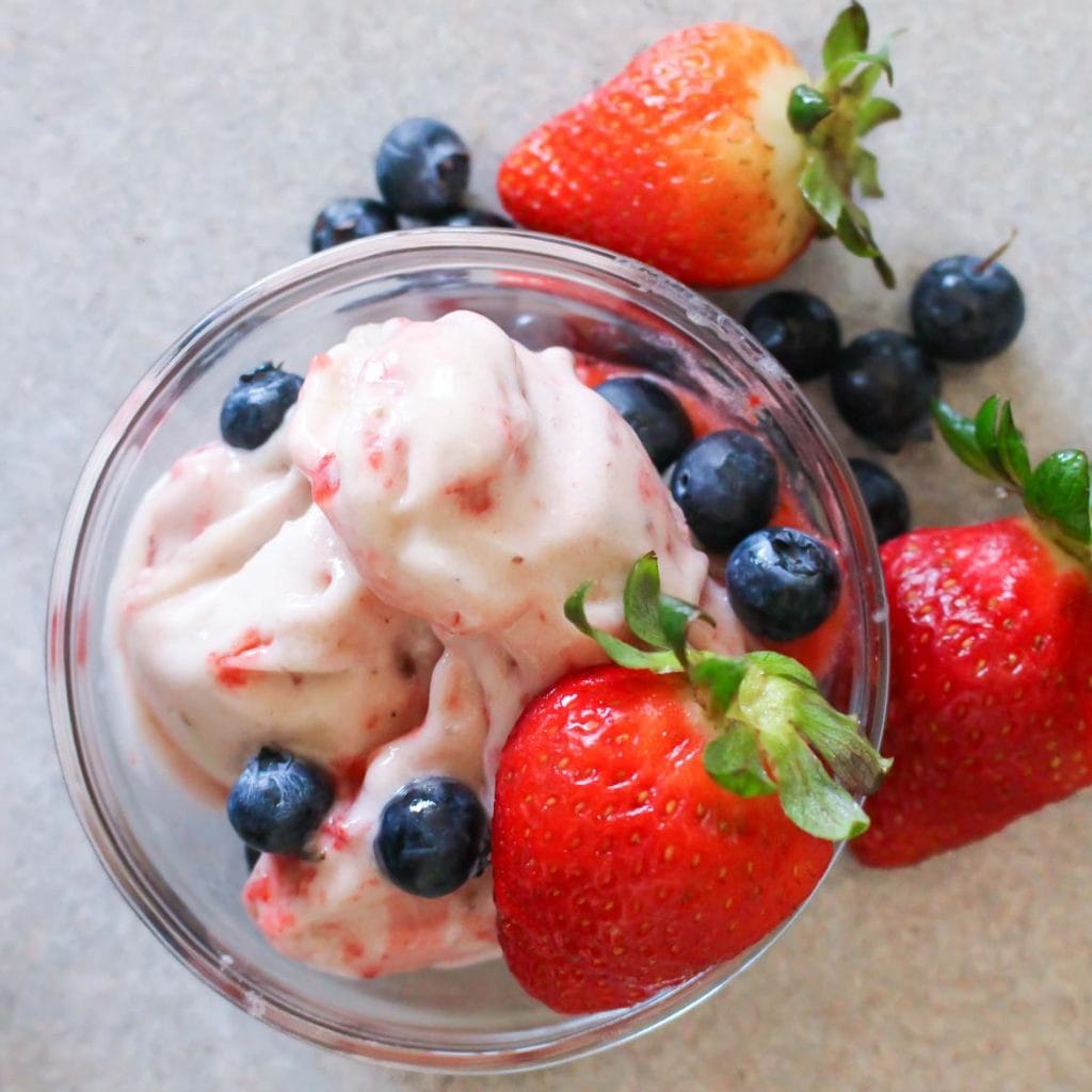 3 ingredient vegan ice cream with bananas strawberries and blueberries