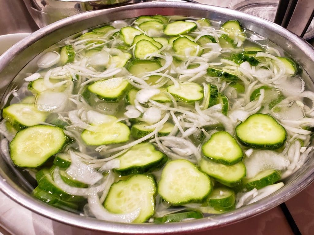 cucumbers and onions for spicy bread and butter pickles with onions 