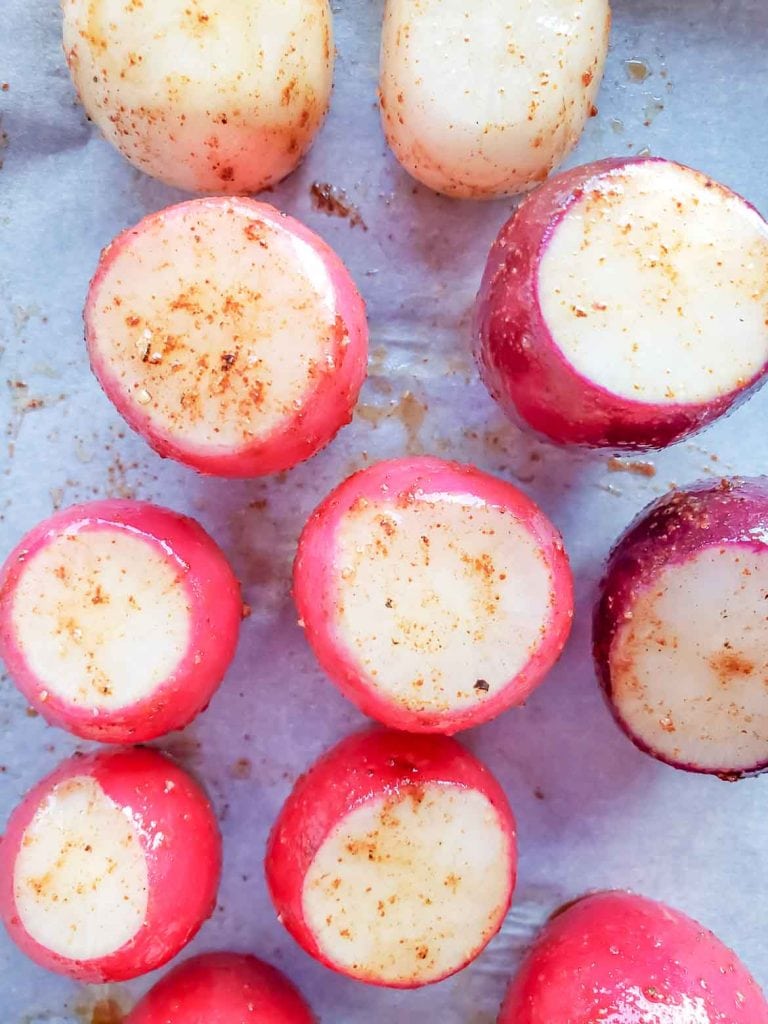 seasoned rainbow radishes ready to roast