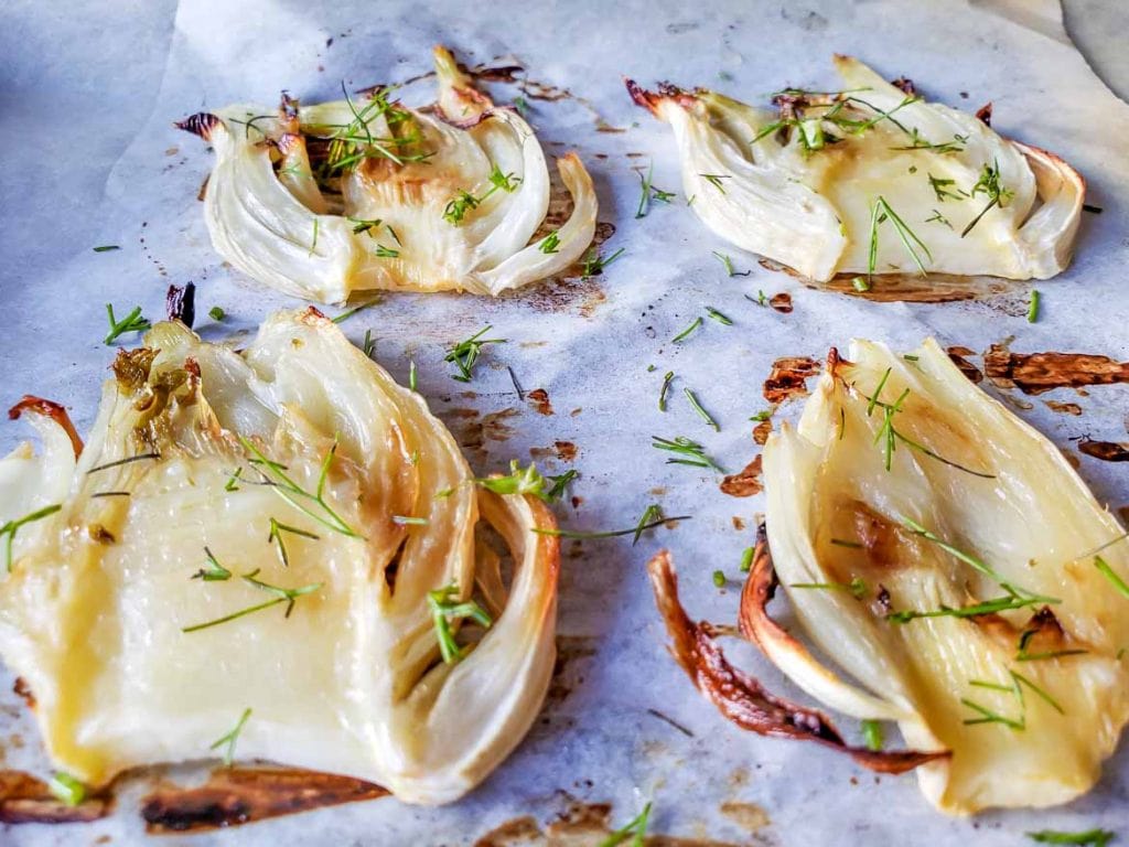 slow roasted fennel baked in oven with dill garish