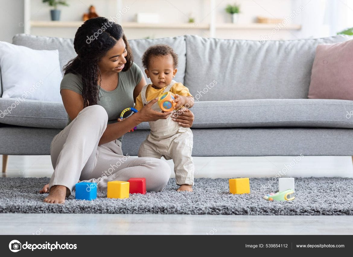 mom and child toddler baby playing with toys parent