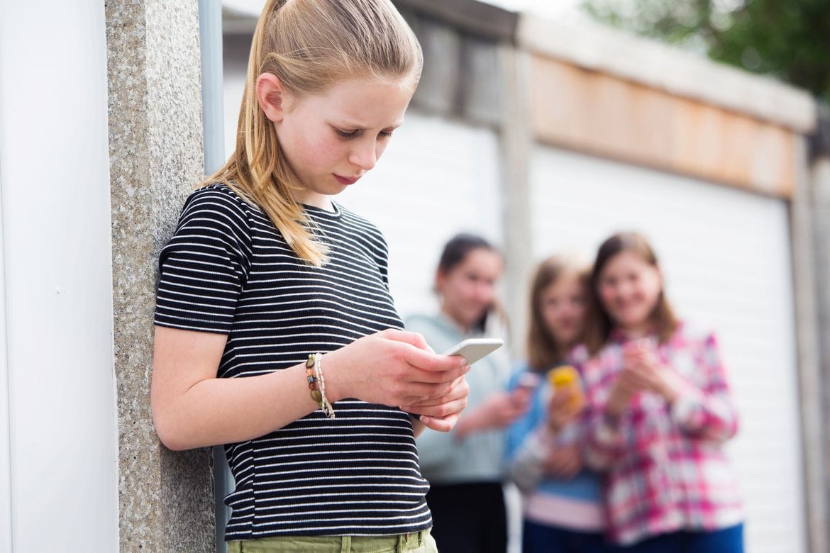 Tips to Keep Your Kids Safe On Social Media Pre Teen Girl Being Bullied By Text Message DP