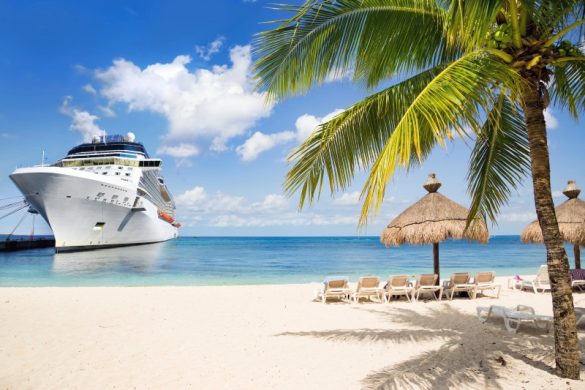 Cruise ship off a tropical beach