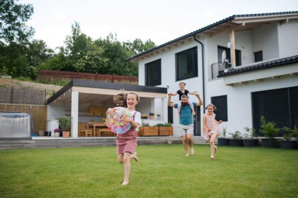 Family playing in backyard