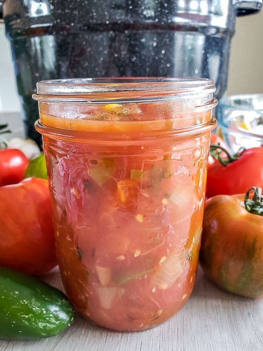 homemade salsa with sweet peppers ready to add canning seal