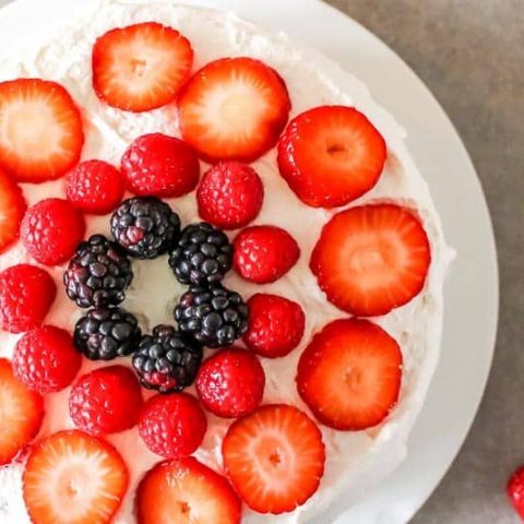 fresh fruit cake with whipped cream