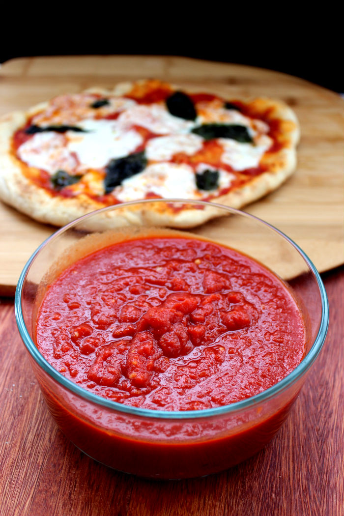 Easy peasy homemade pizza sauce with pizza