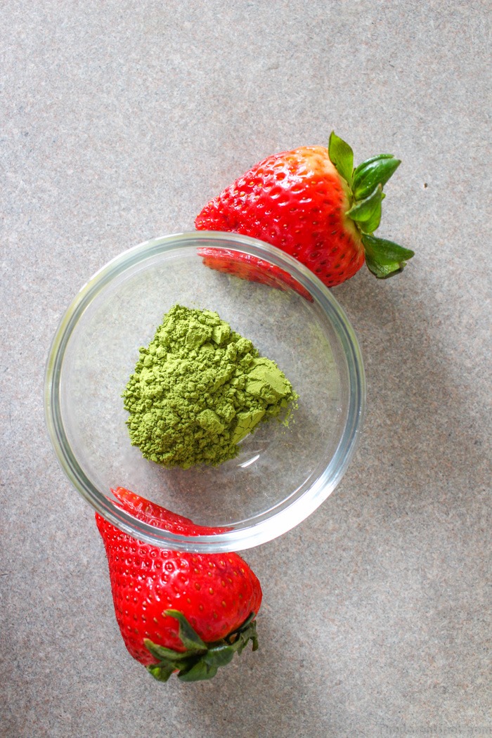 Matcha powder and strawberries for a Green Tea Matcha Berry Smoothie