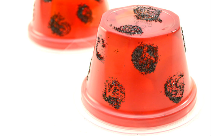 ladybug craft with black glitter added